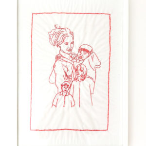 Ibu Yuli's final framed embroidery of her family. It features four figures in a rectangle.
